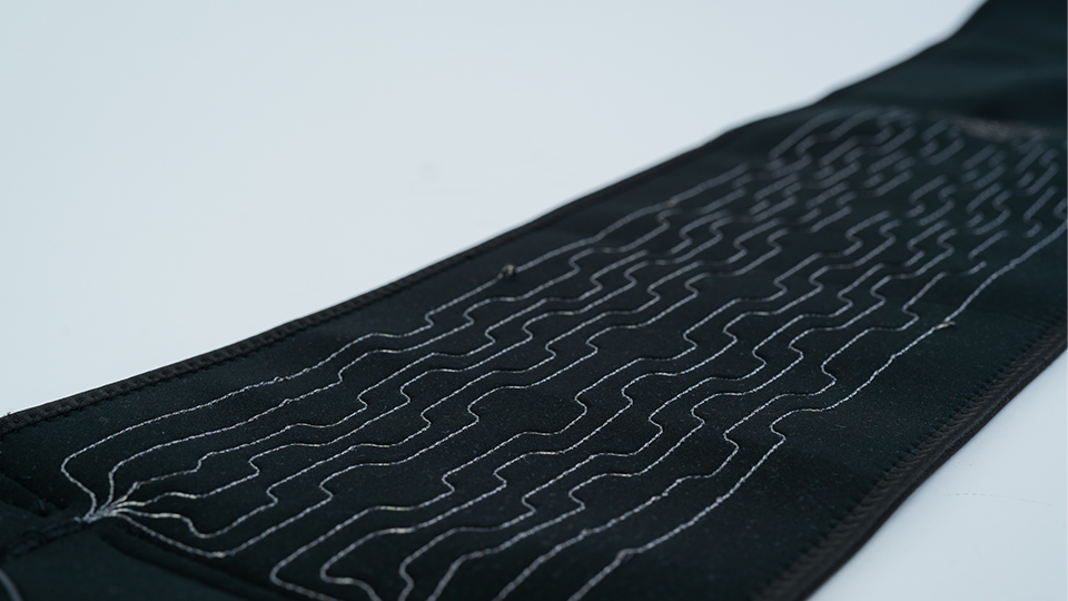 A black heating belt with integrated conductive fibers via embroidery