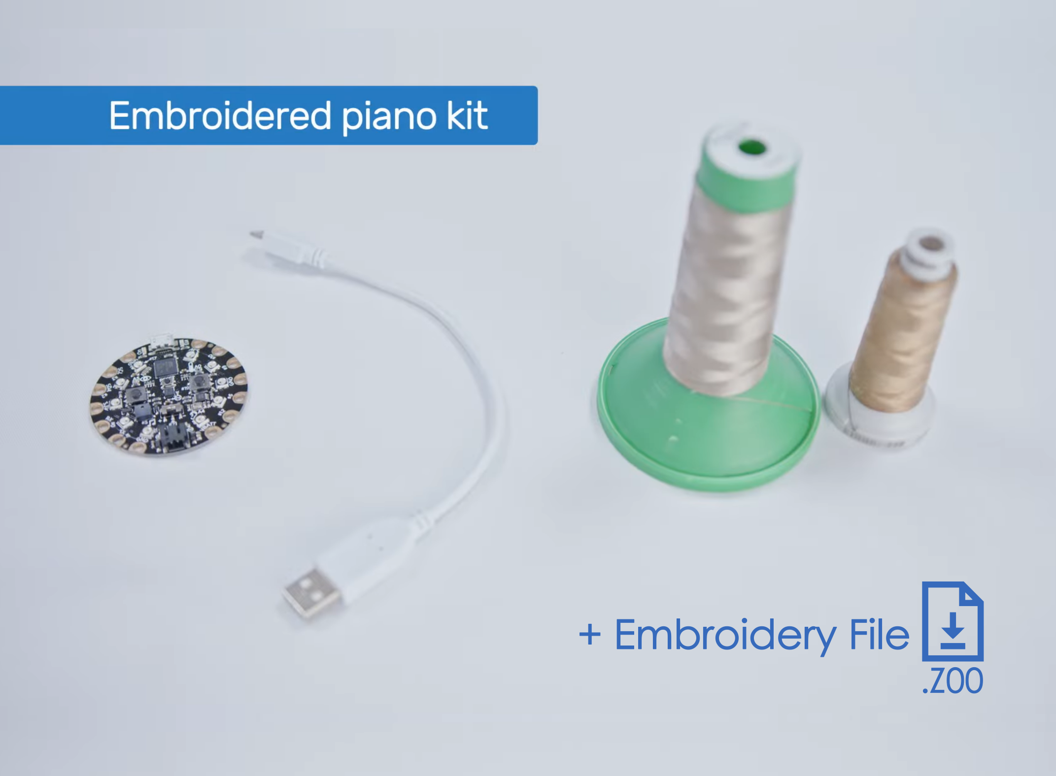 Do-it-Youself (DIY) kit for 3E Embroidered Piano, consisting of a PCB, a USB-cable, a spool of conductive thread, and an embroidery file